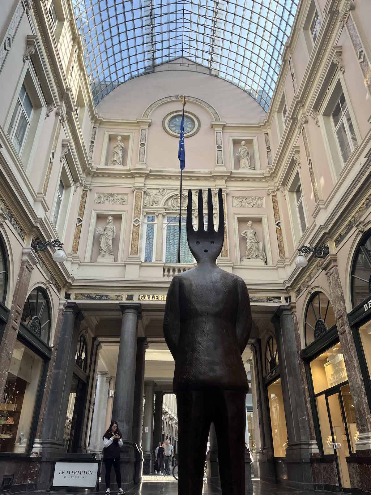Statue in the shopping gallery in Brussels, Belgium.